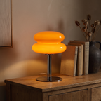 Mira lamp on an oak sideboard at dusk